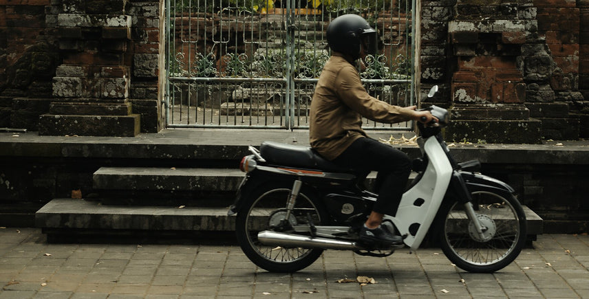 Tulola delivery — courier on a scooter